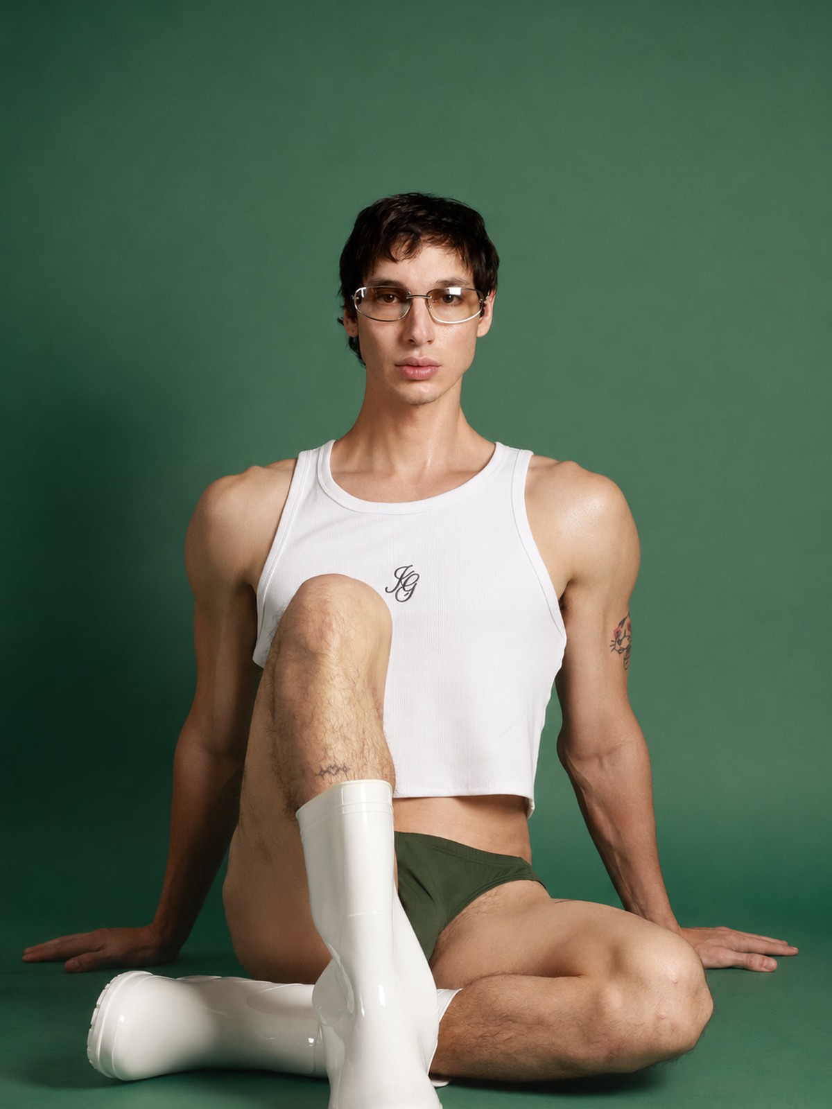 The J.GRANT cropped white ribbed tank with signature monogram.